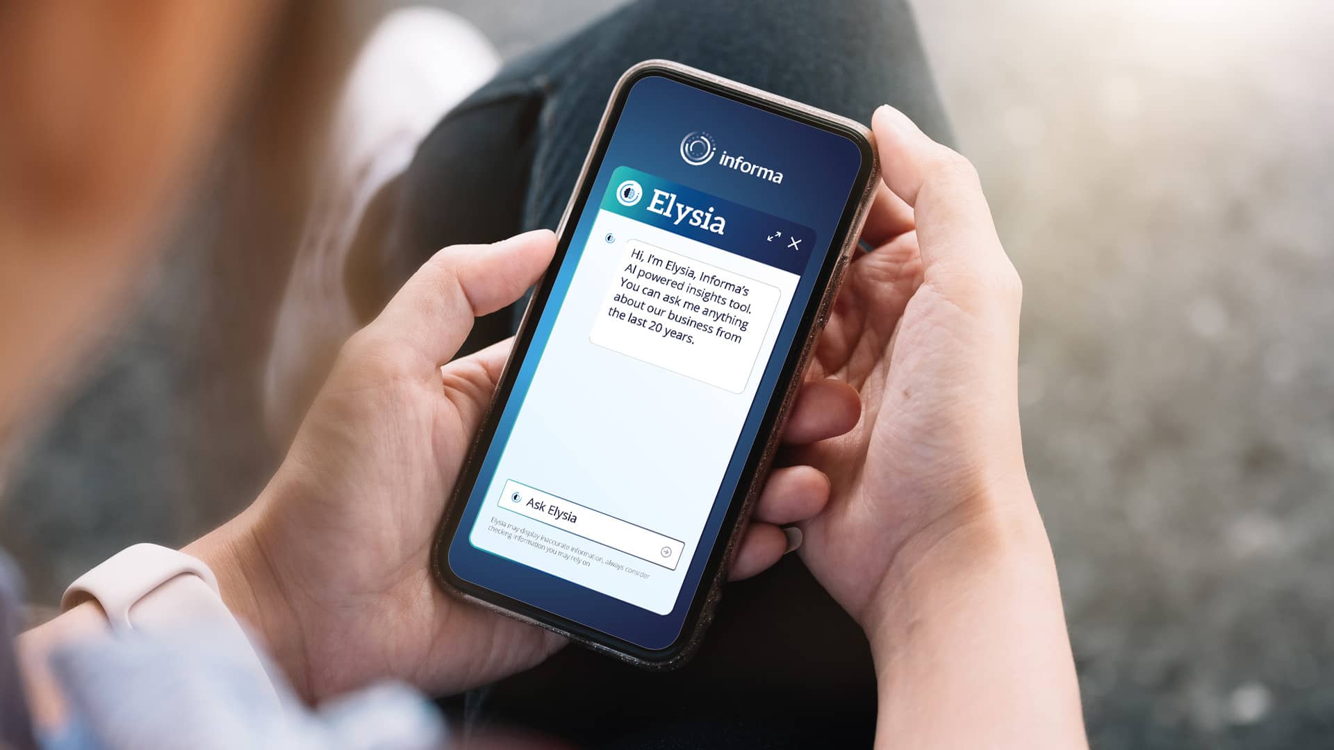 Image of employee using Elysia on phone