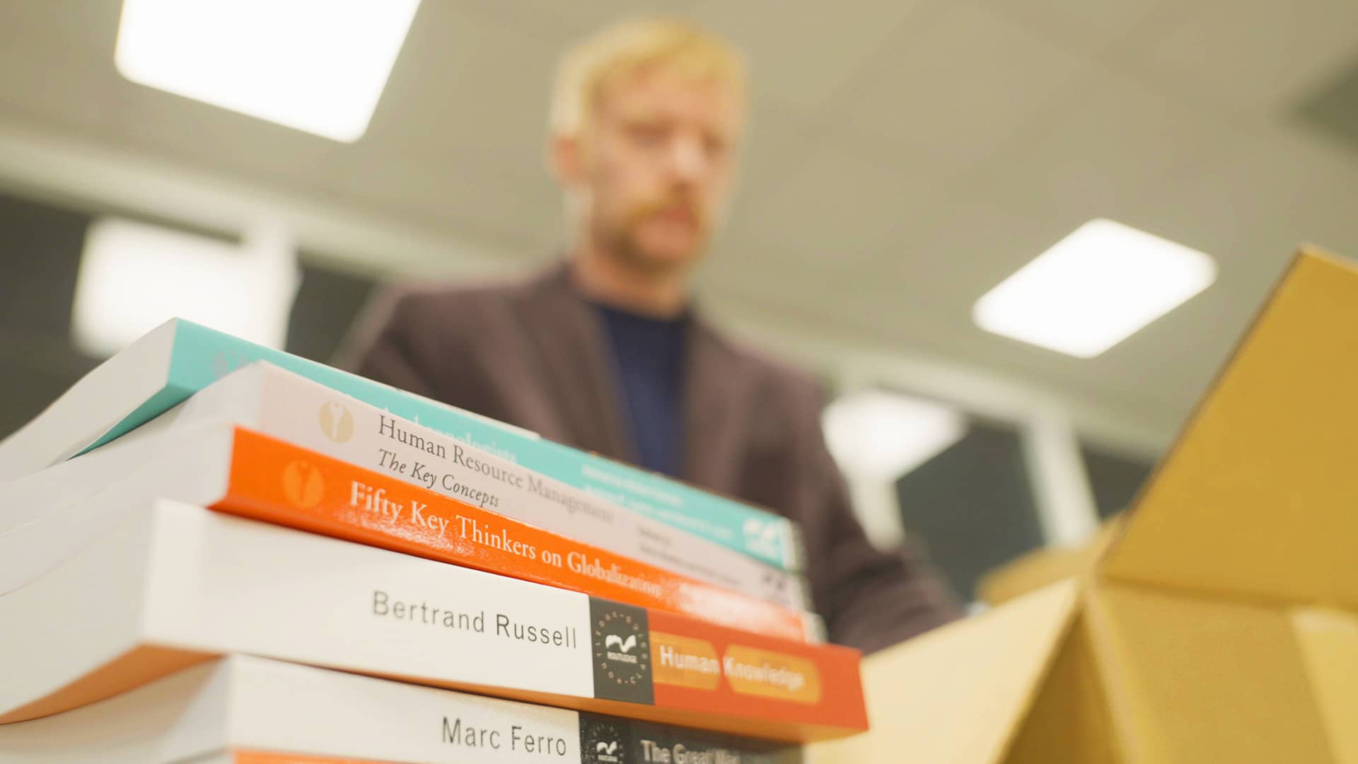Image of books being packed