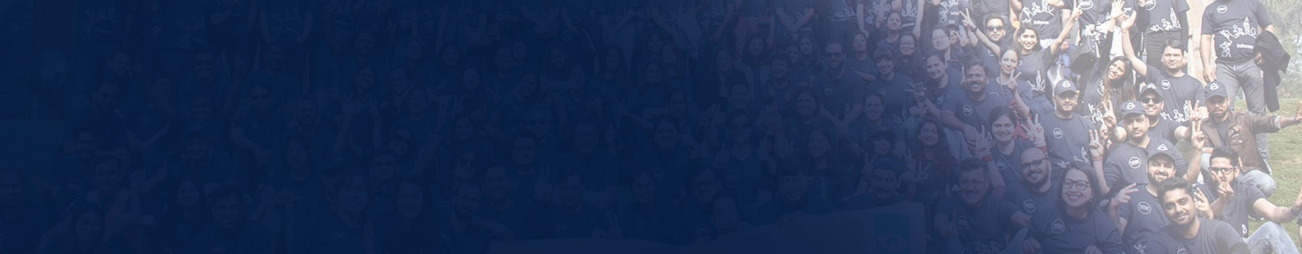 Photo of a large group of people smiling